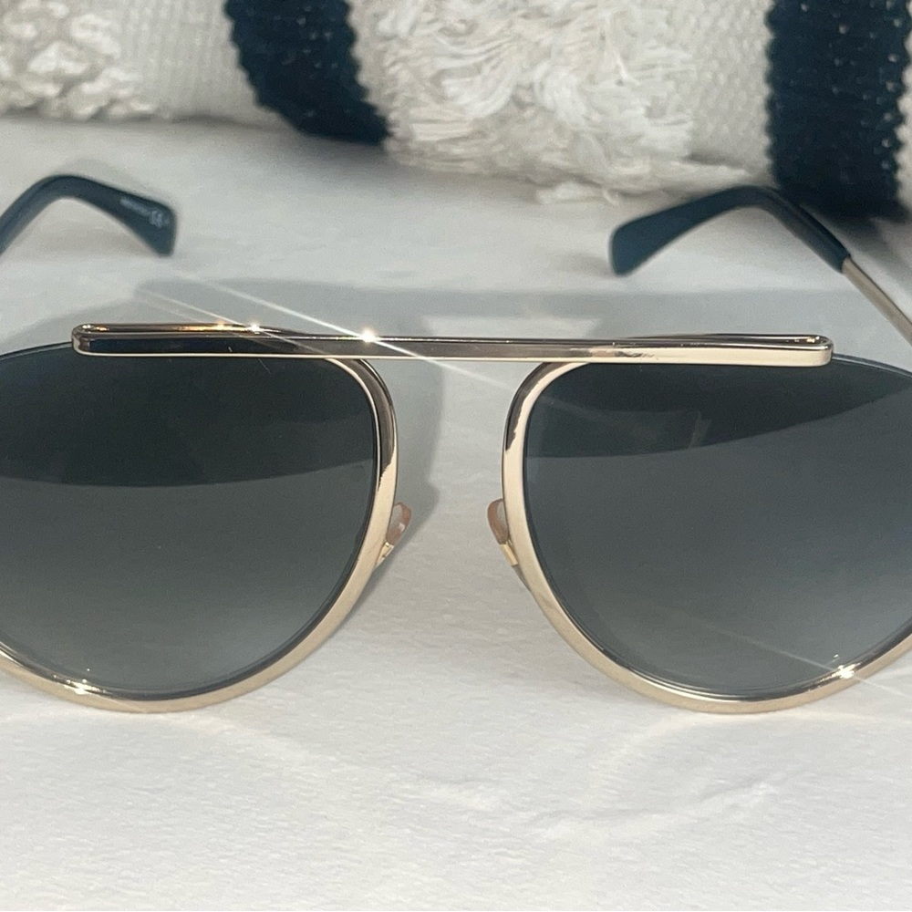 Authentic Givenchy sunglasses complete with original case and box! Great price